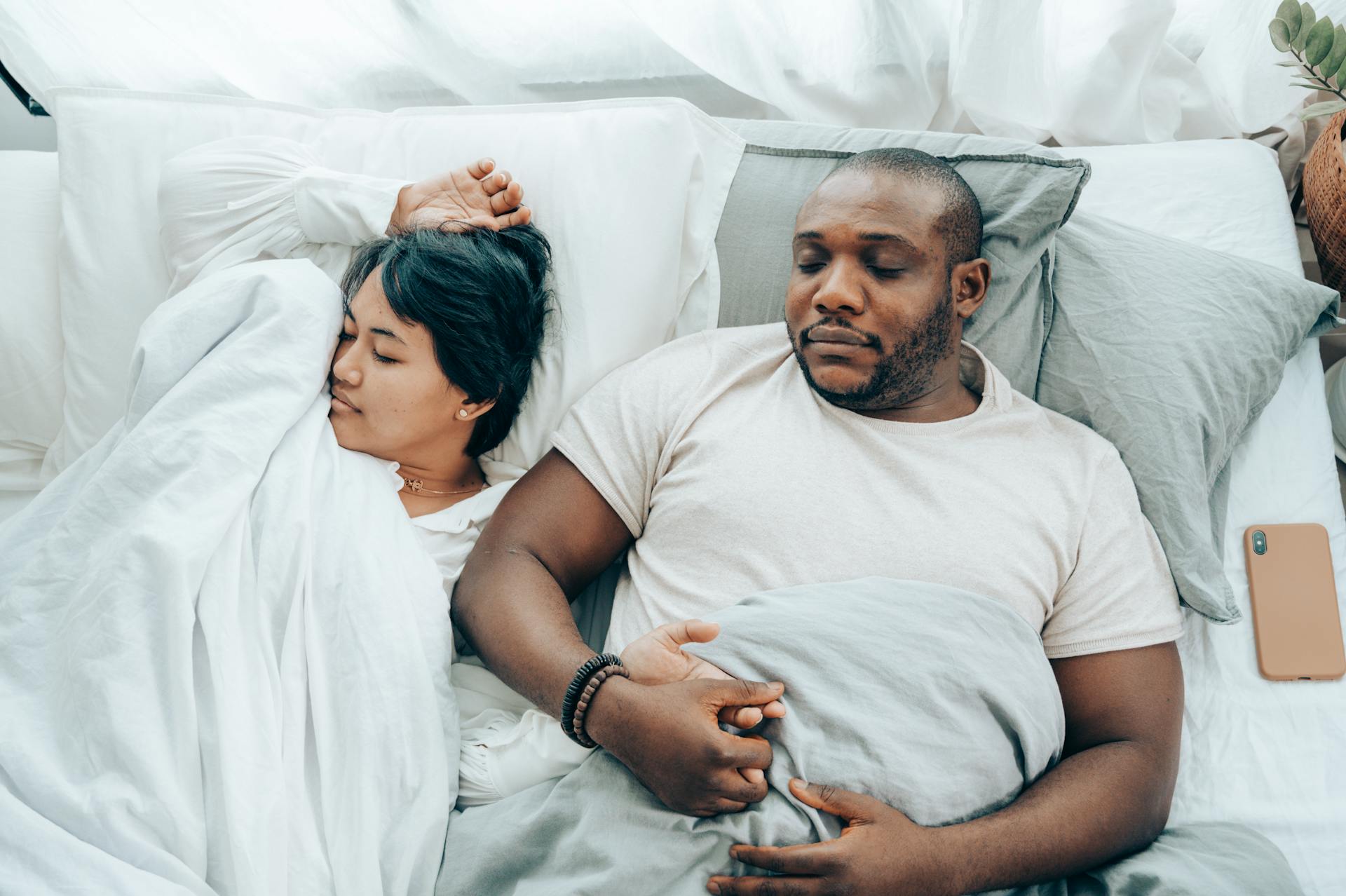 pexels-ketut-subiyanto-4545201 Couple sleeping in bed